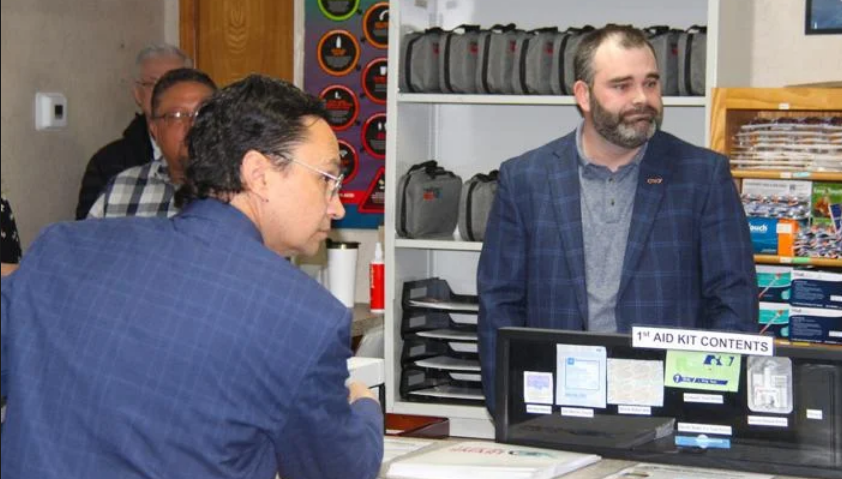 During a tour, Coleman Cox, director of the Cherokee Nation Harm Reduction Program, did a mock enlistment of Principal Chief Chuck Hoskin Jr. to explain how clients are enrolled. Photo/Sean Rowley - Cherokee Phoenix