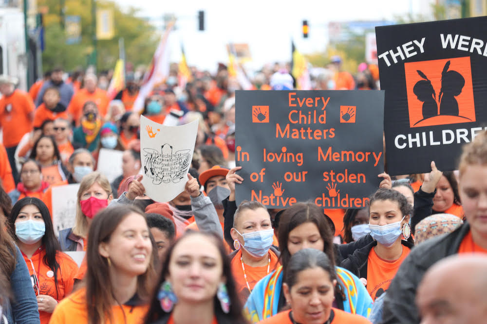 Hundreds marched in Minneapolis at the Boarding School Survivor and Victim Memorial March on Friday. (Photo/Darren Thompson for Native News Online.)