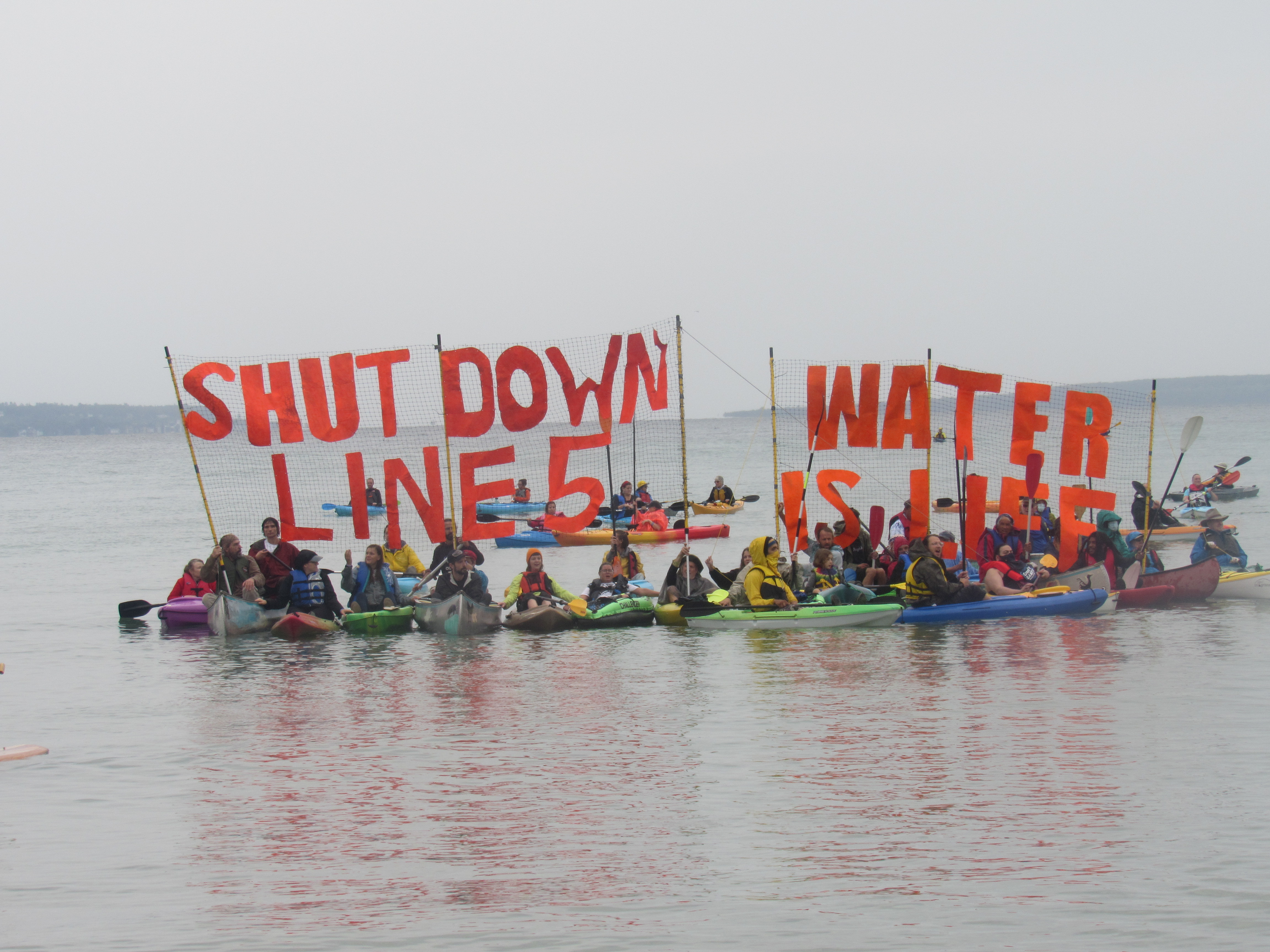 Native Americans and allies gathered at the “Pipe Out Paddle Up Flotilla” at the Straits of Mackinac to call for the shutdown of Line 5. (Photo/Levi Rickert for Native News Online)