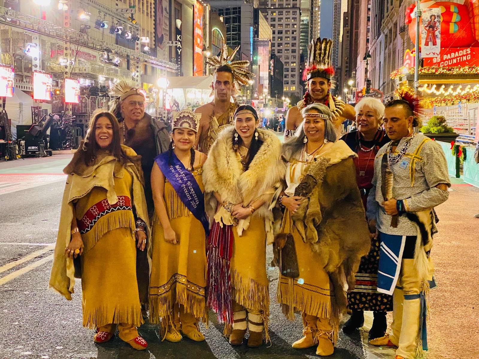 Representing the Mashpee Tribe of The Wampanoag Nation. From Left to Right: Gertrude “Kitty” Miller, John Peters, Dasia Peters, David Pocknett, Talia Landry, Cheenulka Pocknett, Siobhan Brown, Carolyn Wynne, Hartman Deetz. (Photo/Indigenous Direction)
