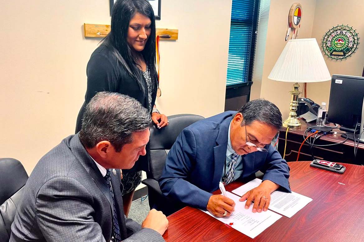 Principal Chief David Hill of the Muscogee Nation signs a contract to begin the lease and purchasing process for the former Cancer Treatment Centers of America in Tulsa, Okla. (Photo/Principal Chief David Hill via Facebook)