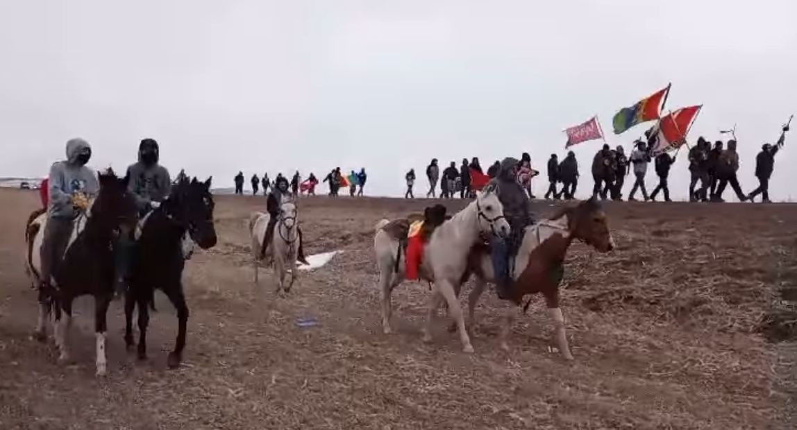 Riderless white horse accompanied the Liberation Day march on Pine Ridge Indian Reservation on Feb. 27 to honor the memory of former Oglala Sioux Tribe Vice President Tom Poor Bear who died from Covid-19.