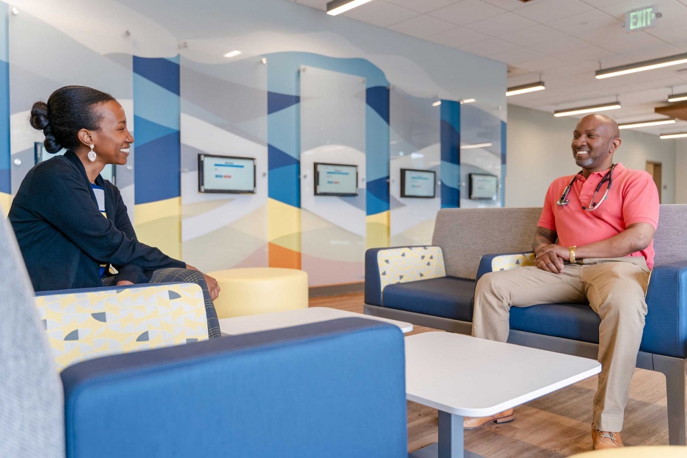 A patient and doctor at WeCare speak in the newly opened facility in Auburn, Wash.