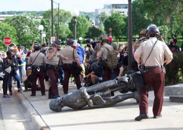 Christopher Columbus statue came down with a thud. Native News Online photographs by Darren Thompson